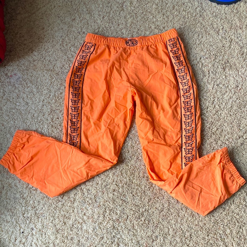 Neon Orange Butterfly Track Pants